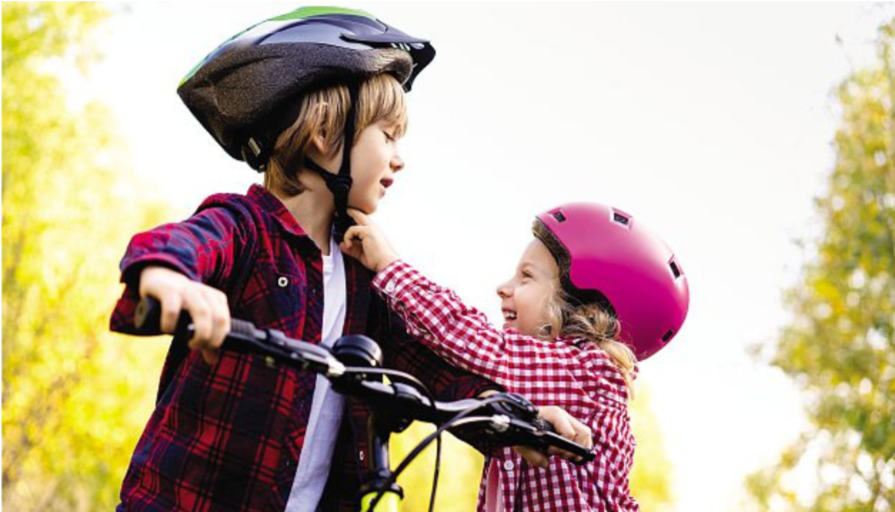 Kids with Bike Helmets - Fruita Bike Helmet Program