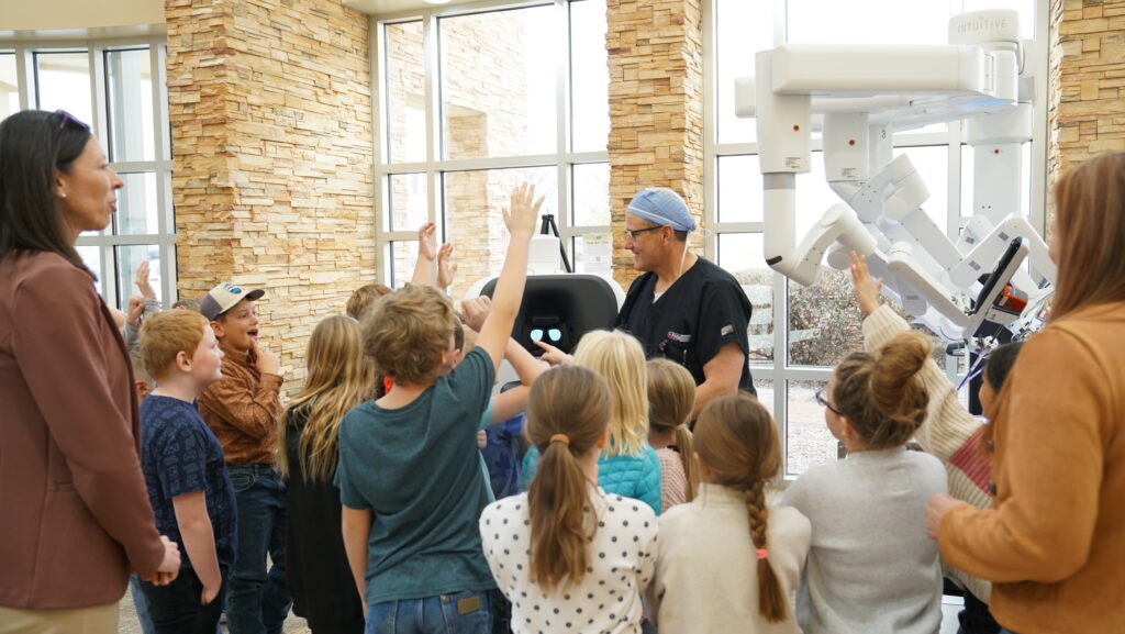 General Surgeon Dr. Morse and the winning class of the FHW Naming contest